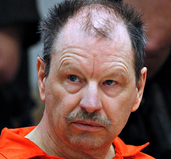 Green River Killer Gary Ridgway listens during his arraignment on charges of murder in the 1982 death of Rebecca "Becky" Marrero, Friday, Feb. 18, 2011, at the King County Regional Justice Center in Kent., Wash. Ridgway already confessed to killing Marrero as part of a 2003 plea deal that spared him the death penalty. (AP Photo/Elaine Thompson)