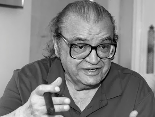 Author Mario Puzo talks during an interview in a New York City hotel on July 25, 1996. (AP Photo/Marty Lederhandler)
